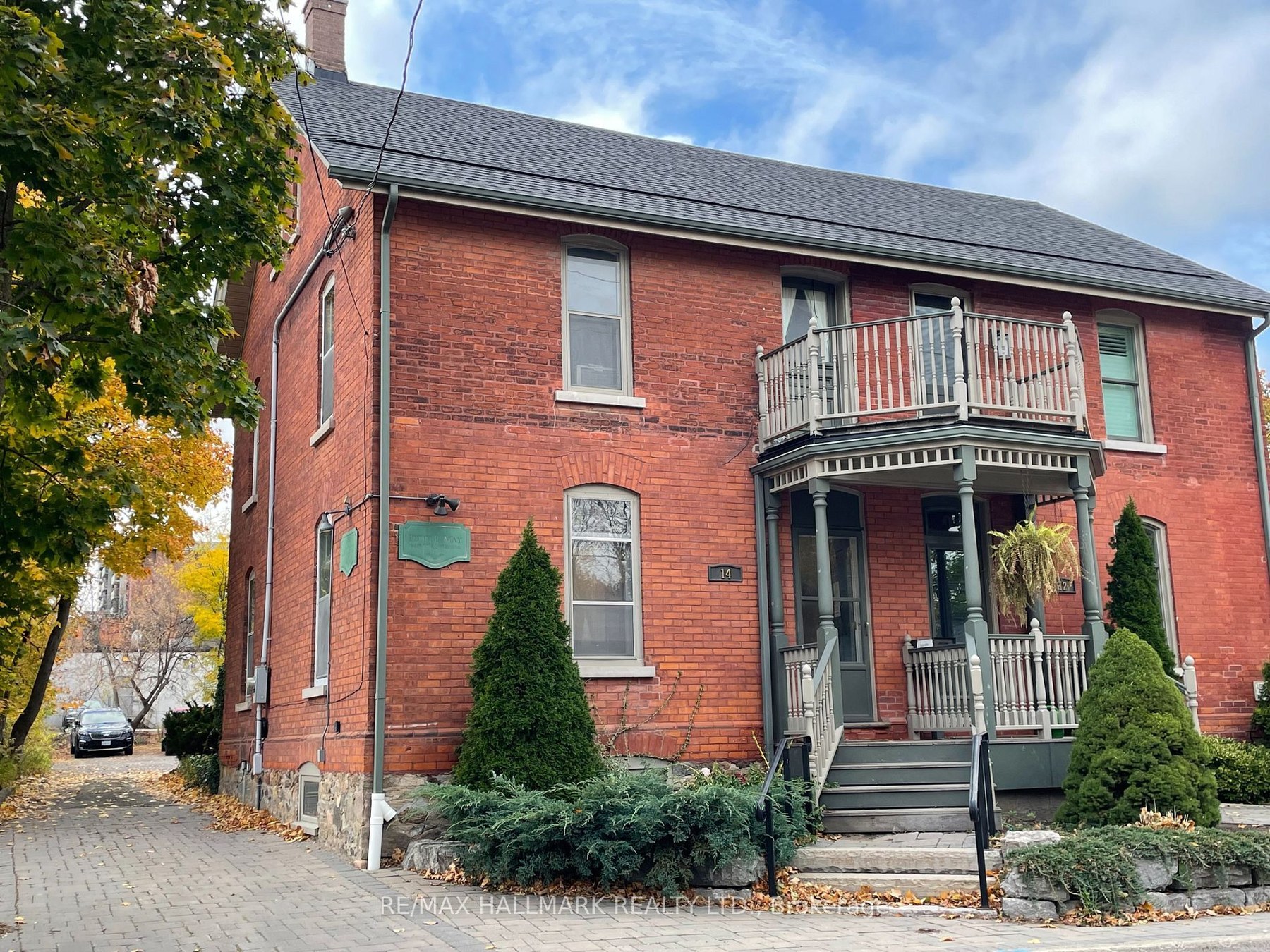 14 Church Street South, heritage brick semi-detached facade with porch and balcony